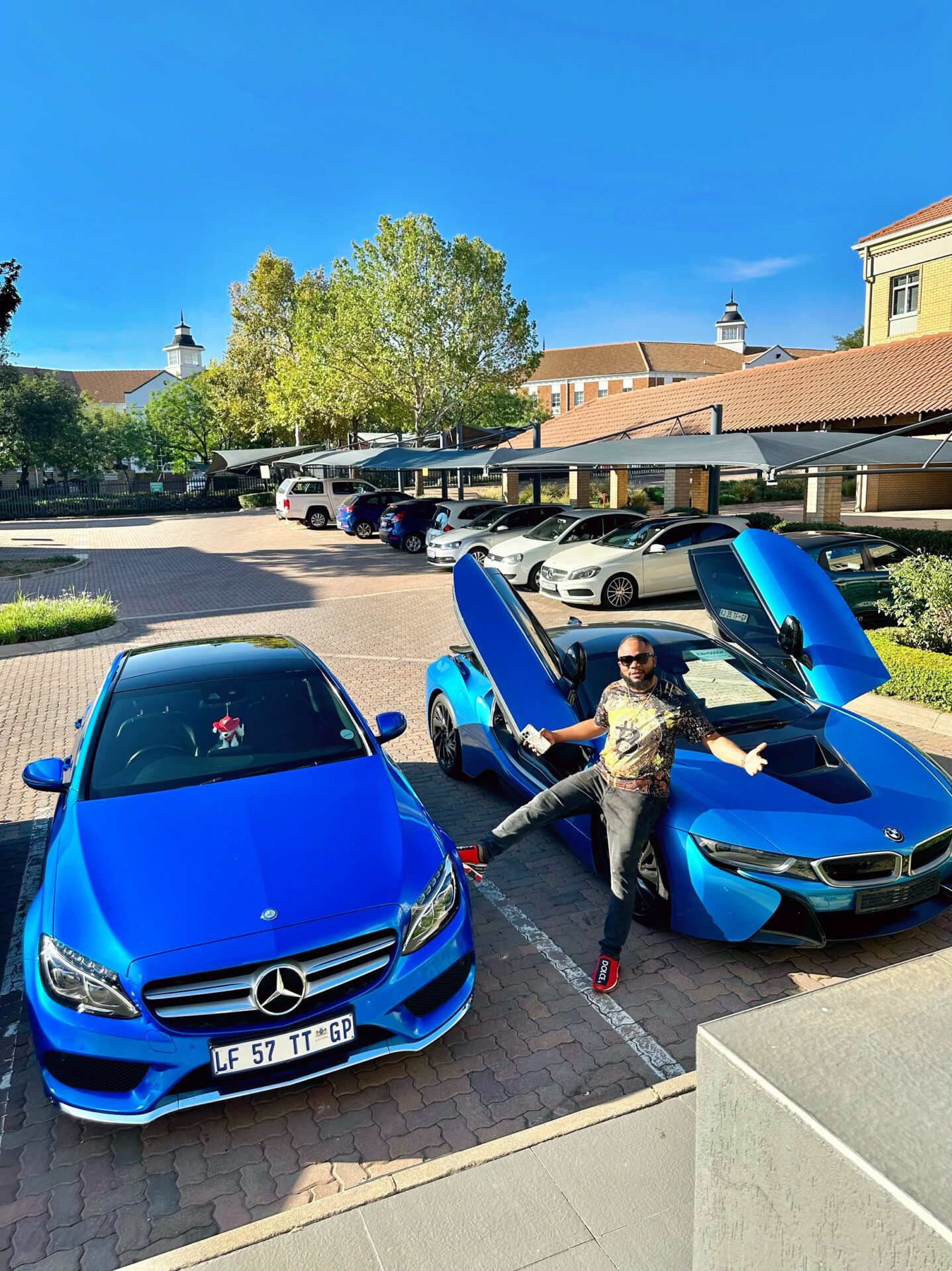 Ndemazeah Godlove with his cars . Riches forex trader in Africa